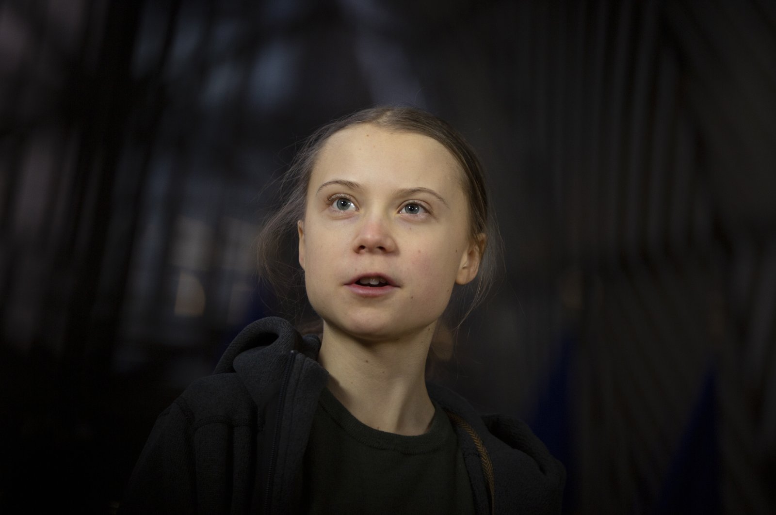 Swedish teenage activist Greta Thunberg speaks with the media as she arrives for a meeting of the Environment Council at the European Council building in Brussels, Belgium, March 5, 2020. (AP File Photo)