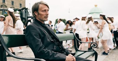 Actor Mads Mikkelsen as history teacher Martin in a still shot from "Another Round." 