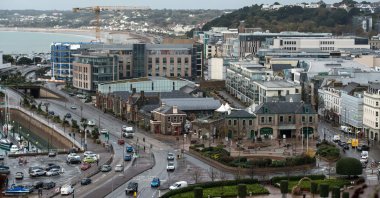 Office and residential buildings are pictured in front of the beach and seafront in St. Helier, on the British island of Jersey, Nov. 9, 2017, Jersey, U.K. (AFP Photo)