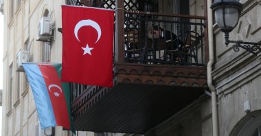 The national flags of Turkey and Azerbaijan hang from a balcony in Baku, Azerbaijan, Oct. 23, 2020. (Photo by Getty Images)