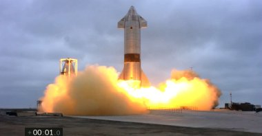 This photo screengrab taken from SpaceX's live webcast shows the Starship SN15 launching from Boca Chica, Texas, U.S., on May 5, 2021.  (SPACEX/AFP Photo)