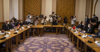 Egyptian Deputy Foreign Minister Hamdi Sanad Loza (L) meets with his Turkish counterpart Sedat Önal (R) at the Foreign affairs Ministry in Cairo, Egypt, May 5, 2021. (EPA Photo)