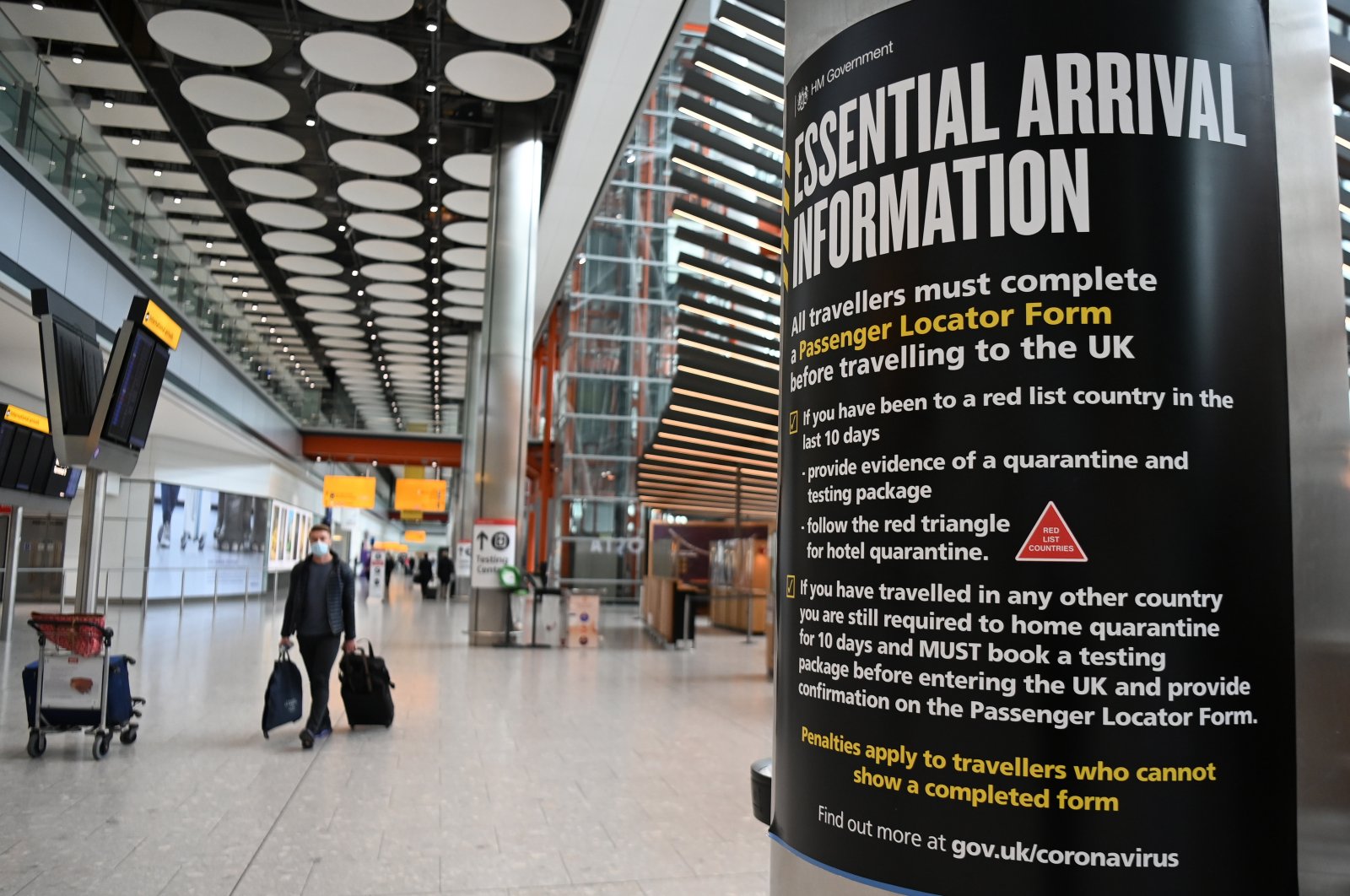 A quarantine sign for so-called "red list" countries at Heathrow Airport in London, Britain, May 3, 2021. (EPA Photo)