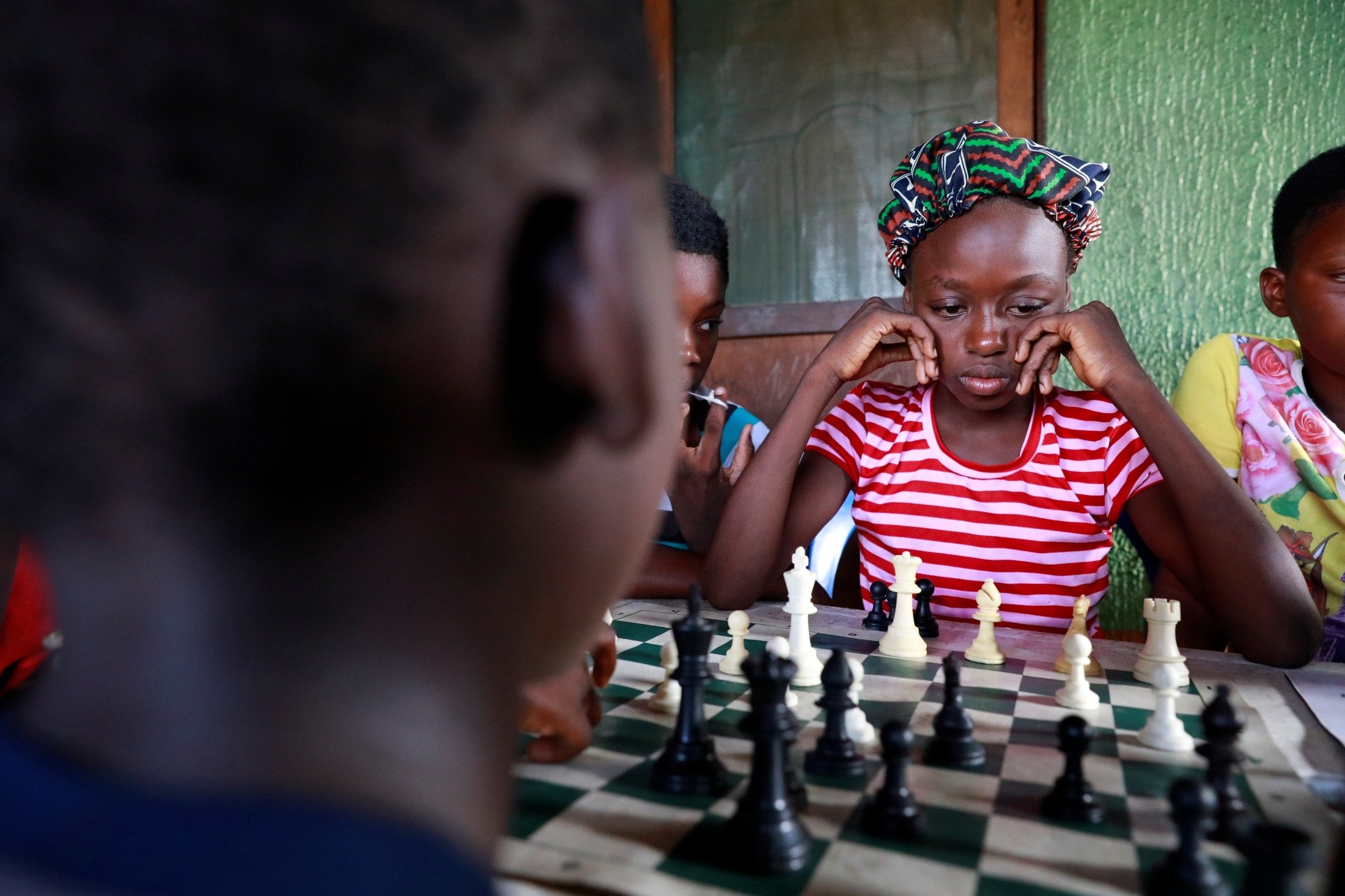 Children play chess at a community palace in Makoko, Lagos, Nigeria, May 5, 2021. (Reuters Photo)