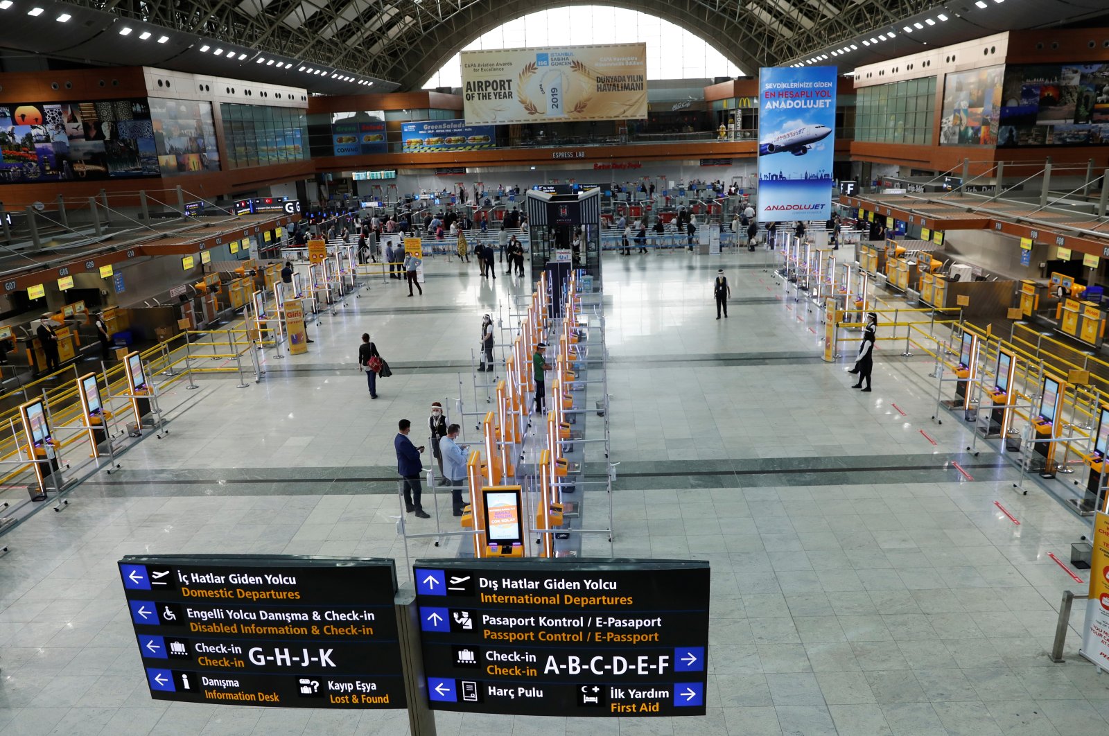 Pegasus Airlines self check-in counters are seen at the nearly empty domestic departure terminal of the Sabiha Gökçen Airport, in Istanbul, Turkey June 11, 2020. (Reuters Photo)