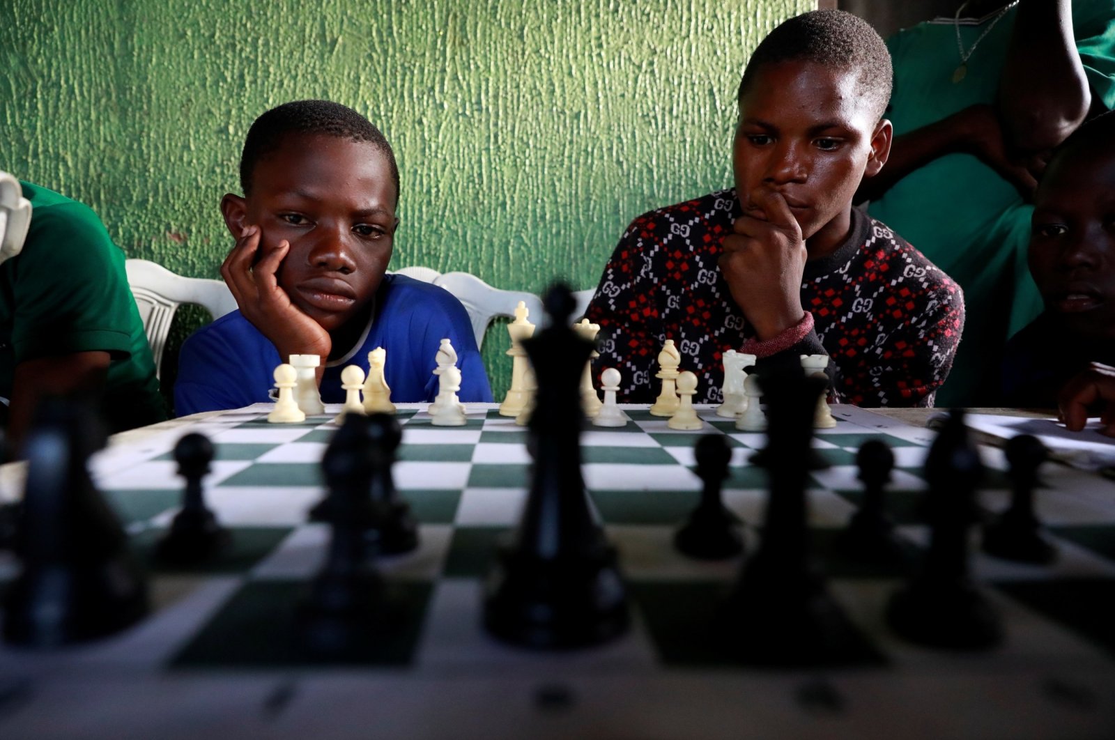Children play chess at a community palace in Makoko, Lagos, Nigeria, May 5, 2021. (Reuters Photo)