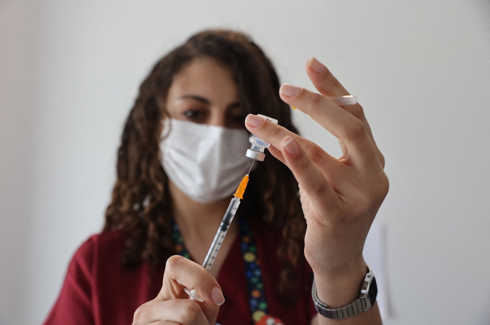 A nurse prepares to administer a second dose of the Pfizer-BioNTech vaccine to a patient, in the capital Ankara, Turkey, May 3, 2021. (AFP PHOTO)