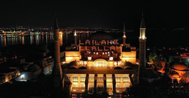 The Hagia Sophia Grand Mosque is seen in this aerial picture after it was adorned with traditional Ramadan mahya, in Istanbul, Turkey, May 7, 2021. (IHA Photo)