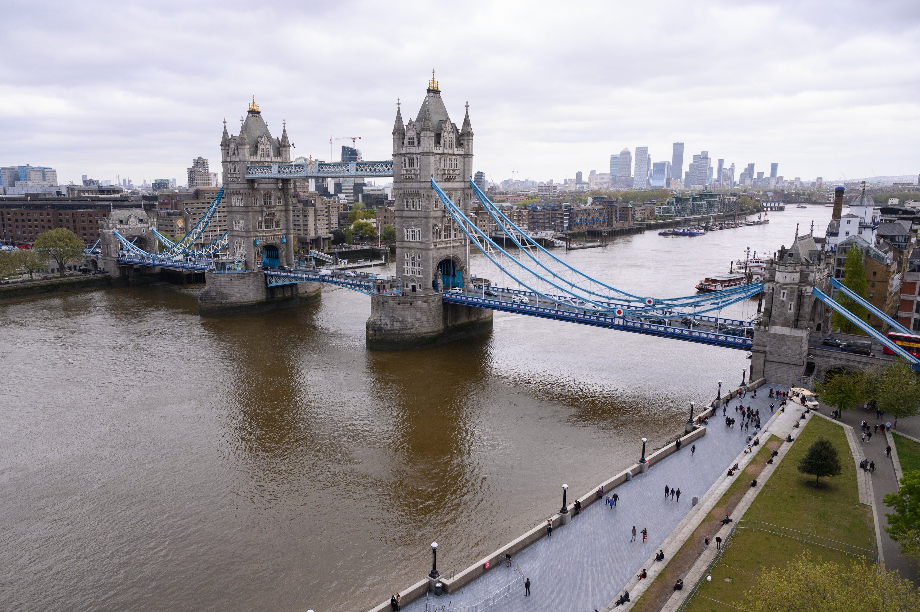 A general view of Tower Bridge spanning the River Thames, with the Canary Wharf financial district visible in the distance is seen, London, U.K., May 8, 2021. (Photo by Getty Images)