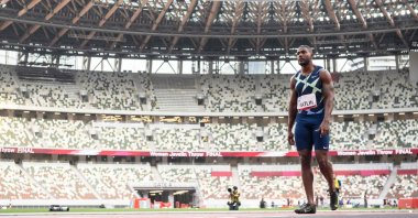 U.S. athlete Justin Gatlin prepares to compete in a heat of the men's 100-meter during an athletics test event for the 2020 Tokyo Olympics at the National Stadium, Tokyo, Japan, May 9, 2021. (AFP Photo)