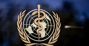 A sign of the World Health Organization (WHO) is seen at the entrance of the agency's headquarters in Geneva, Switzerland, May 8, 2021. (AFP Photo)