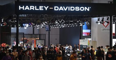 People visit the Harley-Davidson stand at the 19th Shanghai International Automobile Industry Exhibition in Shanghai, China, April 21, 2021. (AFP Photo)