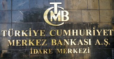 The logo of the Central Bank of the Republic of Turkey (CBRT) at the entrance of the bank's headquarters in Ankara, Turkey, April 19, 2015. (Reuters Photo)