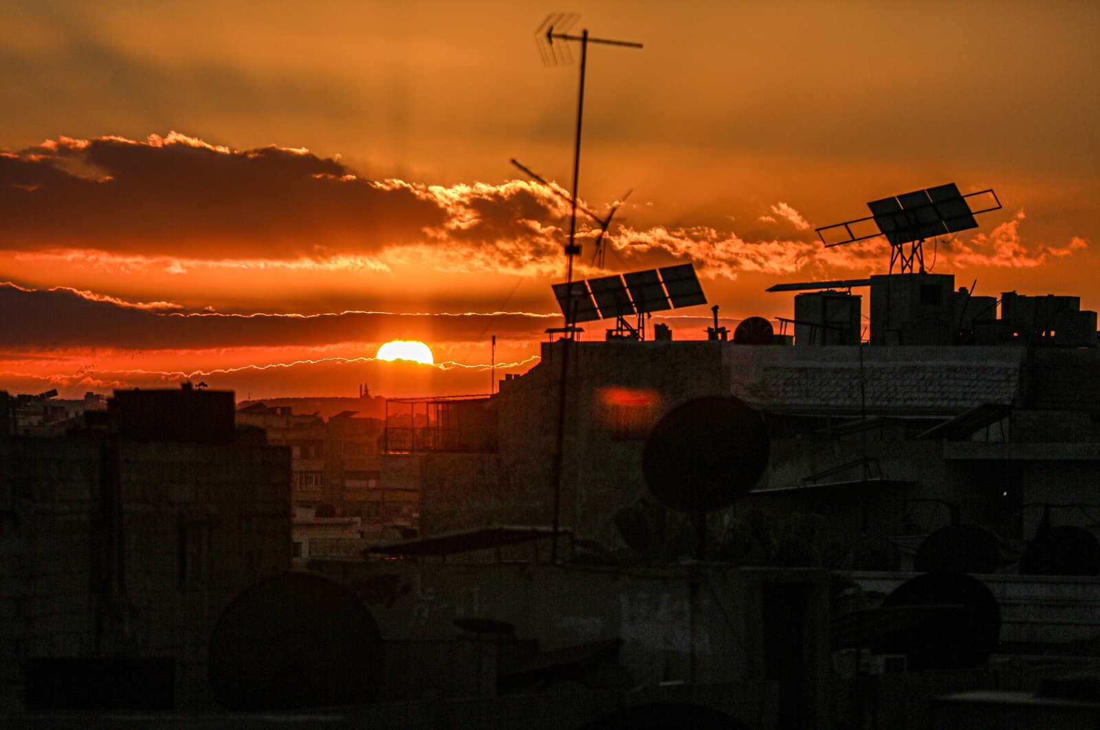 A sunset seen over the Idlib province, northern Syria, Feb. 15, 2021. (Photo by Getty Images)