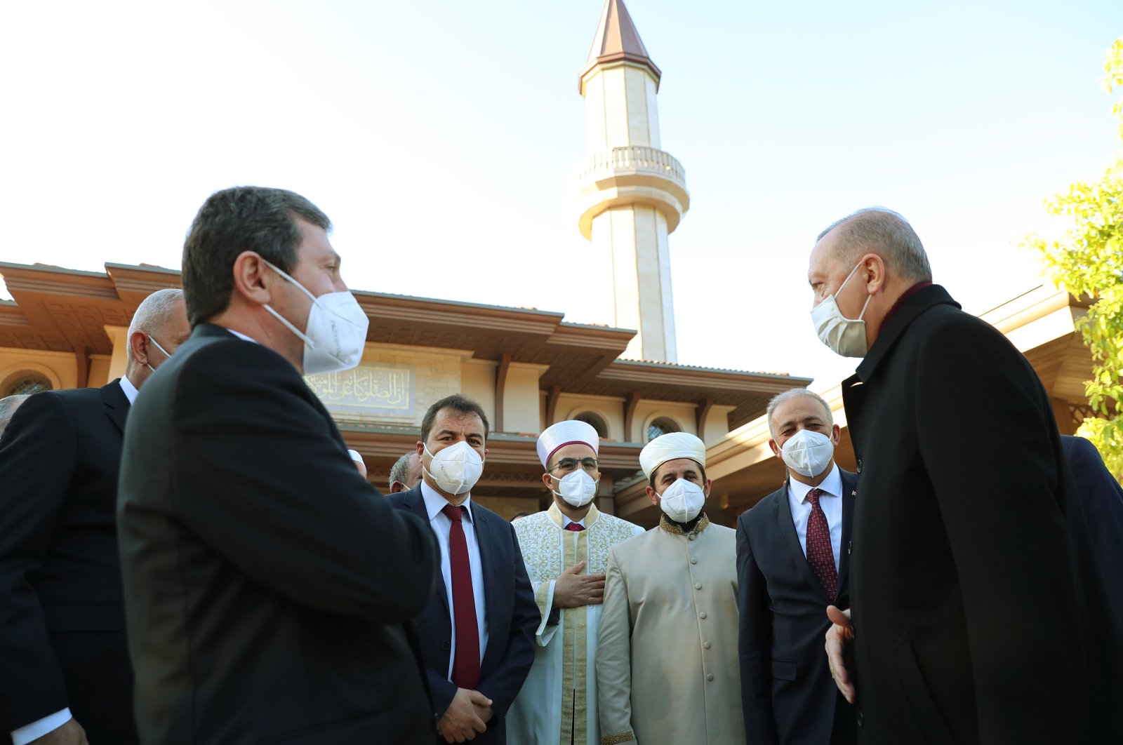 President Recep Tayyip Erdoğan exchanges bayram greetings following Ramadan Bayram prayers in Marmaris, southwestern Turkey, May 13, 2021. (TCCB/Murat Çetinmühürdar/AA)