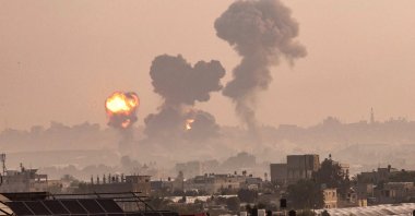 Fire and smoke billow from Israeli airstrikes in Khan Yunis, in the southern Gaza Strip, Palestine, May 11, 2021. (AFP Photo)