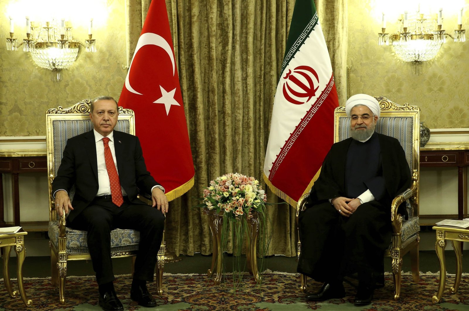 President Recep Tayyip Erdoğan (L) and Iranian President Hassan Rouhani are seen during a meeting in Tehran, Iran, Oct. 4, 2017. (AP Photo)