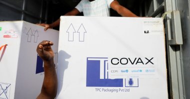 Boxes of AstraZeneca-Oxford coronavirus vaccines, redeployed from the Democratic Republic of Congo, arrive at a cold storage facility in Accra, Ghana, May 7, 2021. (Reuters Photo)