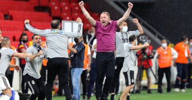 Beşiktaş coach Sergen Yalçın (C) and support staff celebrate winning the Turkish Süper Lig title, Izmir, Turkey, May 15, 2021. (AA Photo)