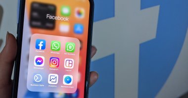 The apps of the Internet group Facebook, including Facebook, WhatsApp, WhatsApp Business, Facebook Messenger, Instagram, Instagram Layout, Facebook Business Suite, Facebook Analytics, Facebook Ads Manager are seen on an iPhone 12. (Getty Images)