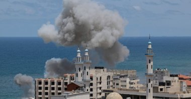 Smoke billows from the port of Gaza City following an Israeli bombardment from the sea, the Gaza Strip, Palestine, May 17, 2021. (AFP Photo)