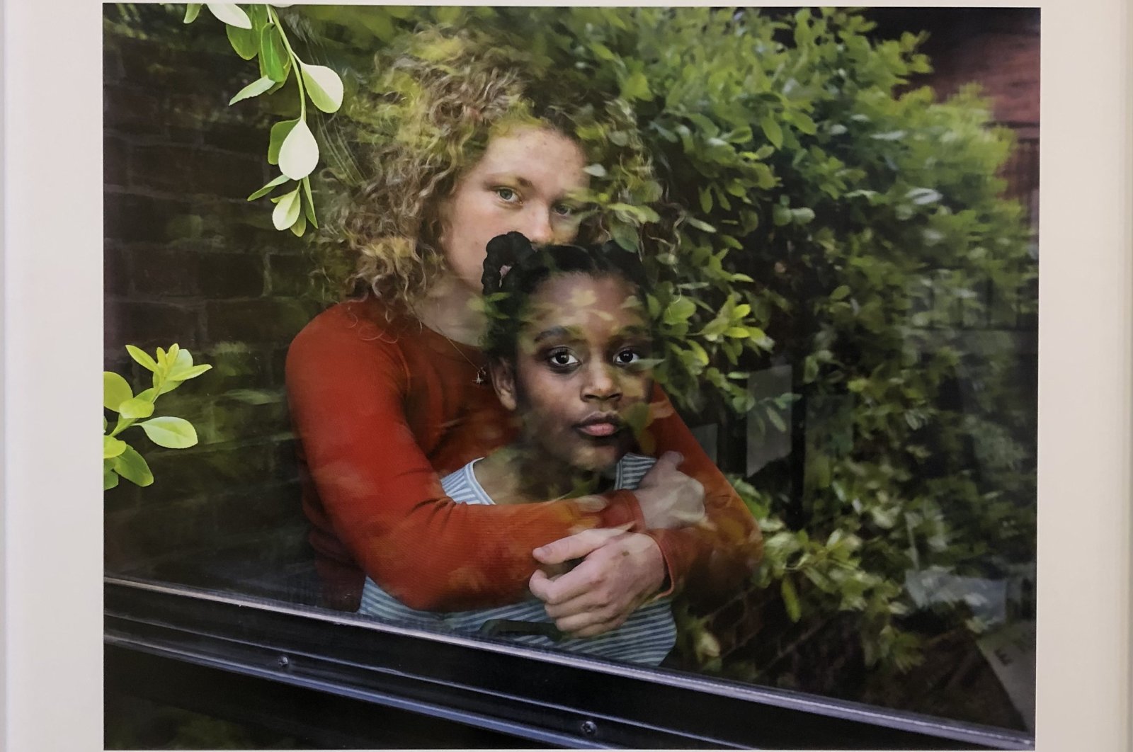 "Orly and Ruth," 2020, the series Across the Window - Portraits During COVID-19 (2020-ongoing), archival pigment print on baryta paper. (Photo by Matt Hanson)