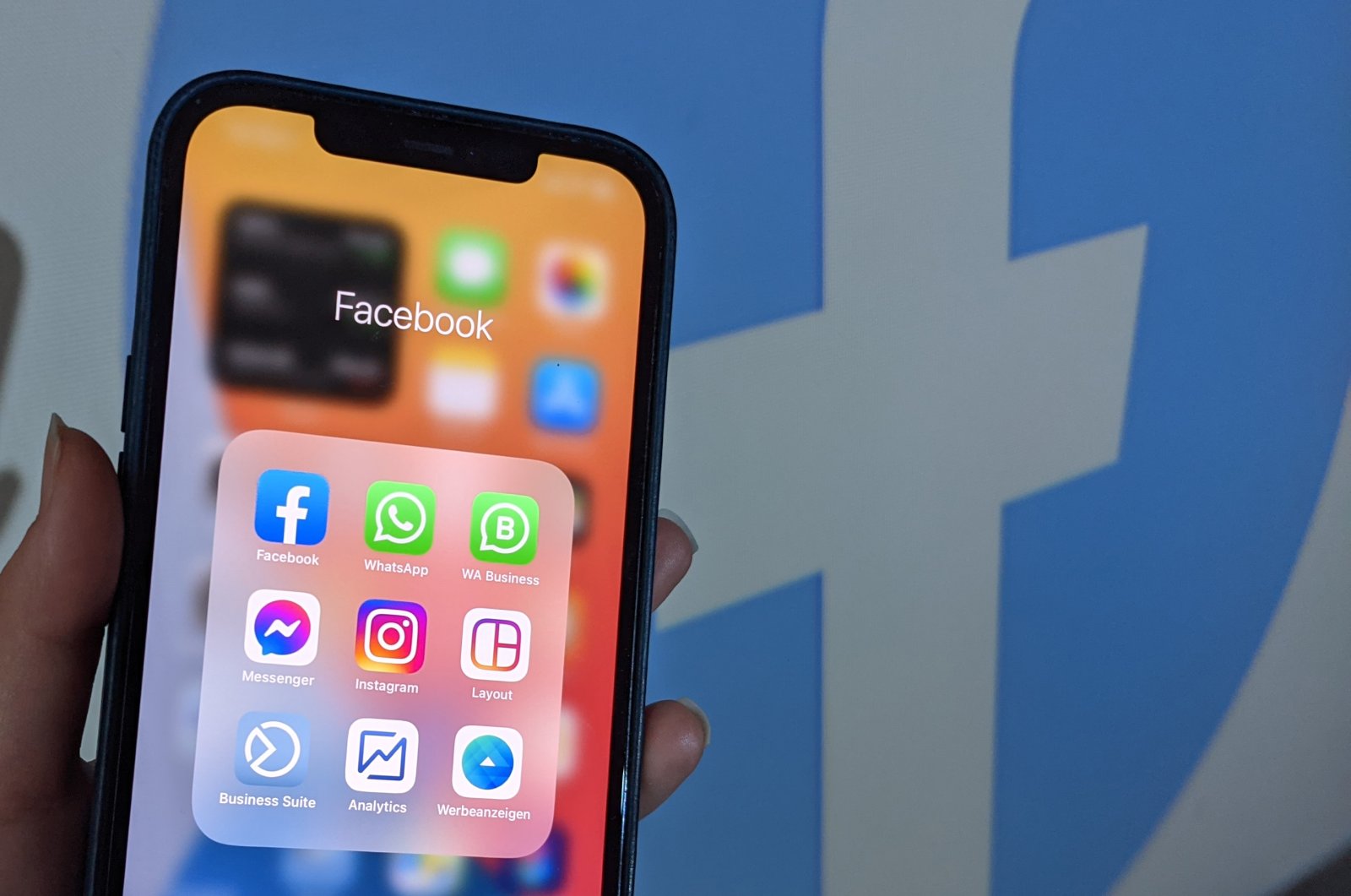 The apps of the Internet group Facebook, including Facebook, WhatsApp, WhatsApp Business, Facebook Messenger, Instagram, Instagram Layout, Facebook Business Suite, Facebook Analytics, Facebook Ads Manager are seen on an iPhone 12. (Getty Images)