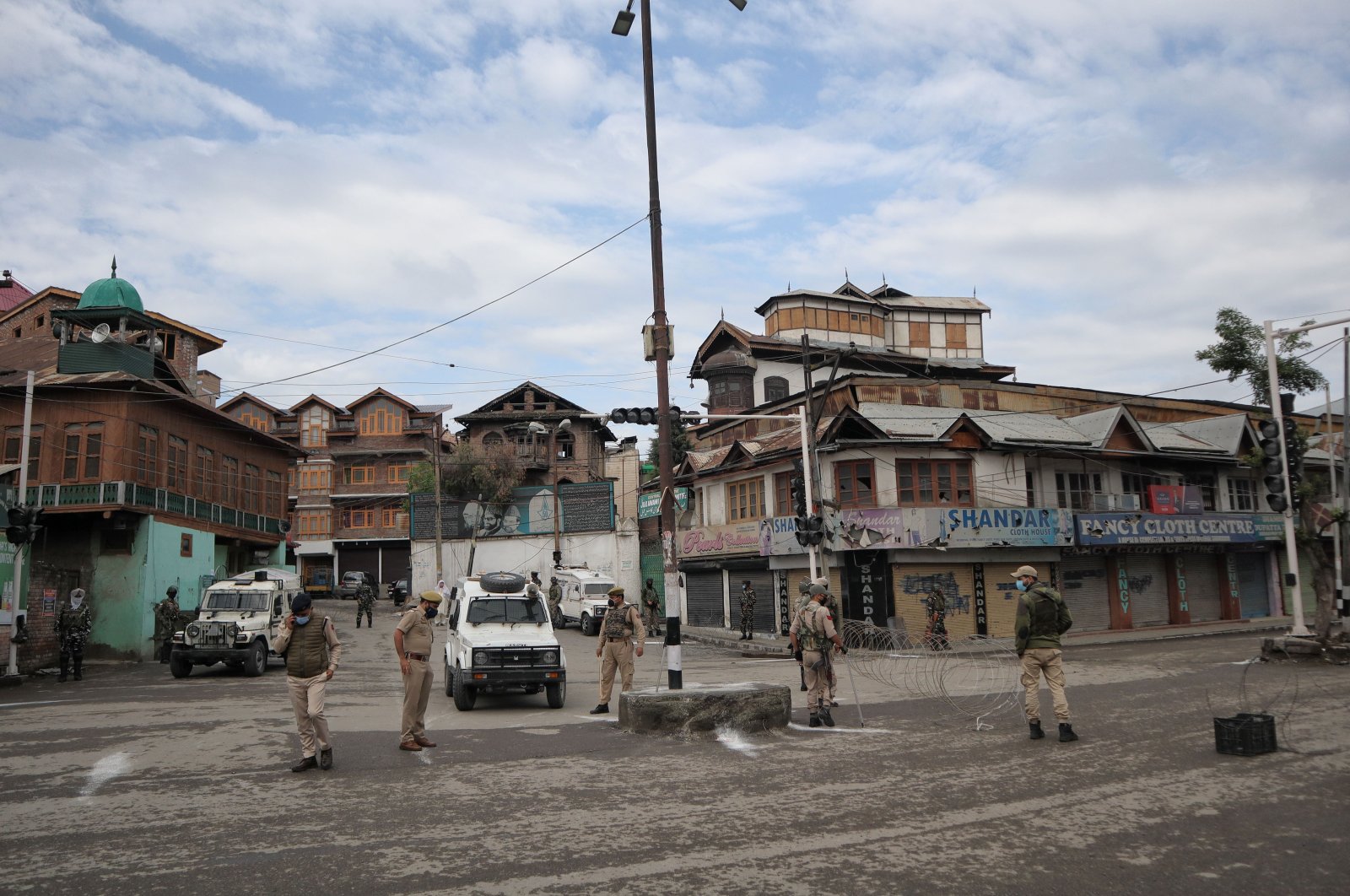 Indian paramilitary forces stand on alert during COVID-19 restrictions on the eve of Ramadan Bayram, also known as Eid al-Fitr, in Srinagar, India-controlled Kashmir, May 13, 2021. (Photo by Getty Images)