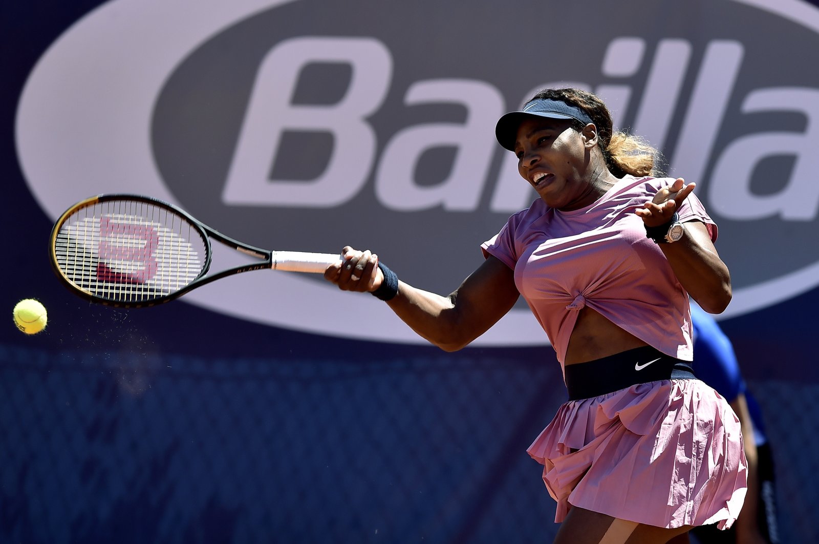 Serena Williams of the United States returns the ball to Italy's Lisa Pigato during their match at the Emilia Romagna Open tennis tournament, in Parma, Italy, May 17, 2021. (AP Photo)