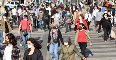 People walk on a street in the capital Ankara, Turkey, May 17, 2021. (AFP Photo)