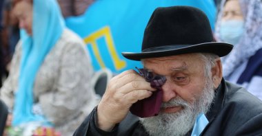 A man reacts during a rally marking the anniversary of the mass deportation of Crimean Tatars from the region in 1944, in Yevpatoriya, Crimea, May 18, 2021. (Reuters Photo)