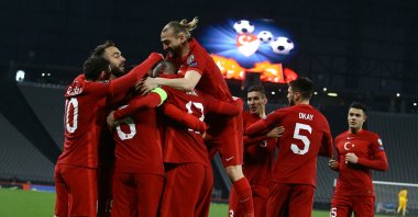 Turkish national team players celebrate a goal against Latvia in a 2022 World Cup qualifiers match at Atatürk Olympic Stadium, Istanbul, Turkey, March 30, 2021. (IHA Photo)