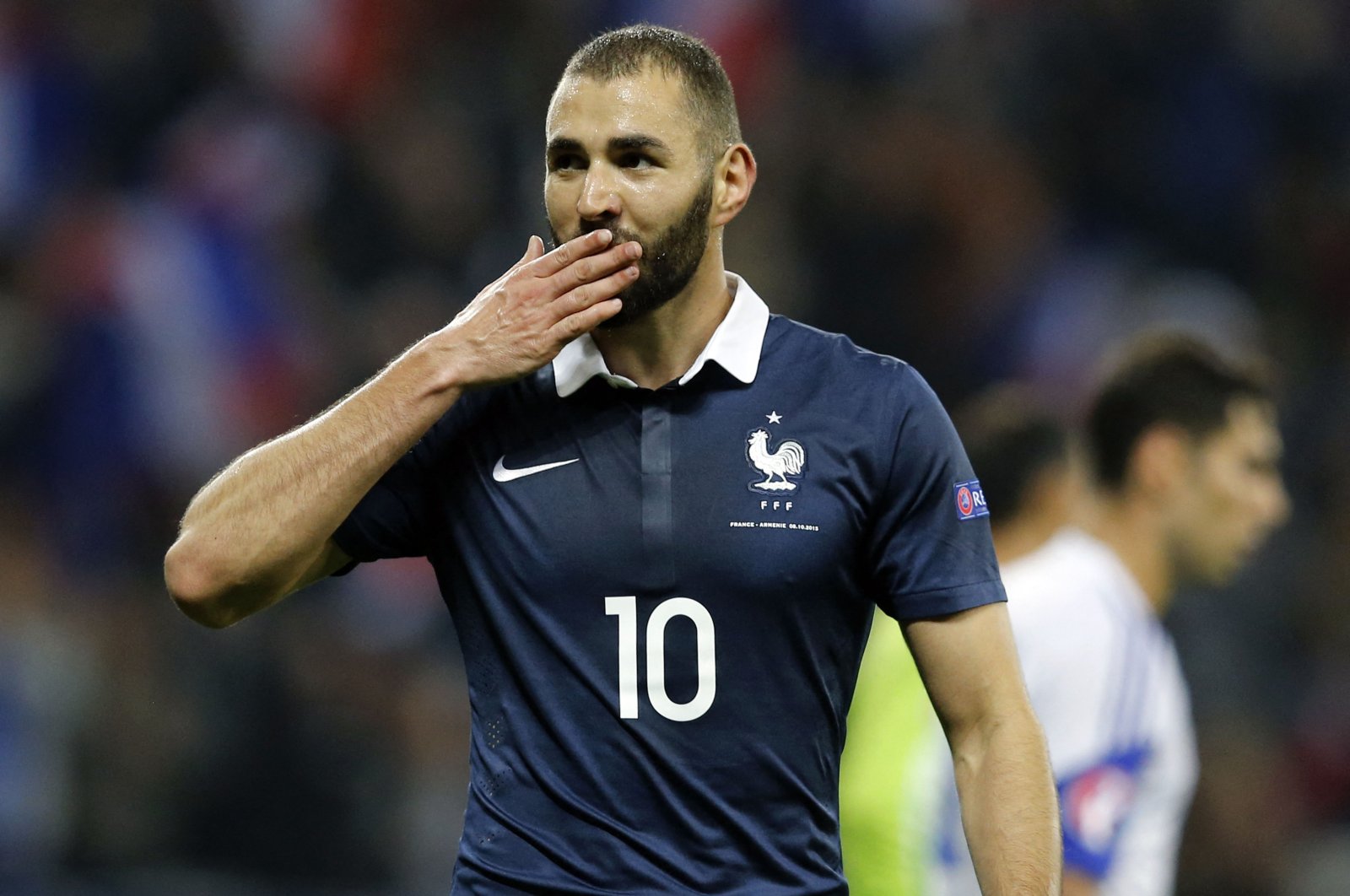 France's forward Karim Benzema celebrates after scoring a goal during the friendly football match between France and Armenia at the Allianz Riviera stadium in Nice, southeastern France, Oct. 9, 2015. (AFP Photo)