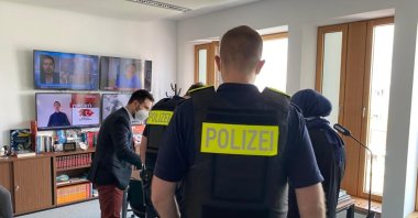 German police receive information from TRT Deutsch officials in the news platform's office in Berlin, Germany, May 19, 2021.