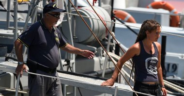 Carola Rackete, Sea-Watch 3 captain, disembarks from a Finance police boat, in Porto Empedocle, Italy July 1, 2019. (REUTERS File Photo)