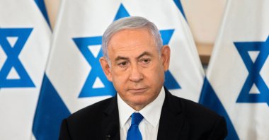 Israeli Prime Minister Benjamin Netanyahu looks on during a briefing to ambassadors to Israel at a military base in Tel Aviv, Israel, May 19, 2021. (Sebastian Scheiner / Pool via Reuters)