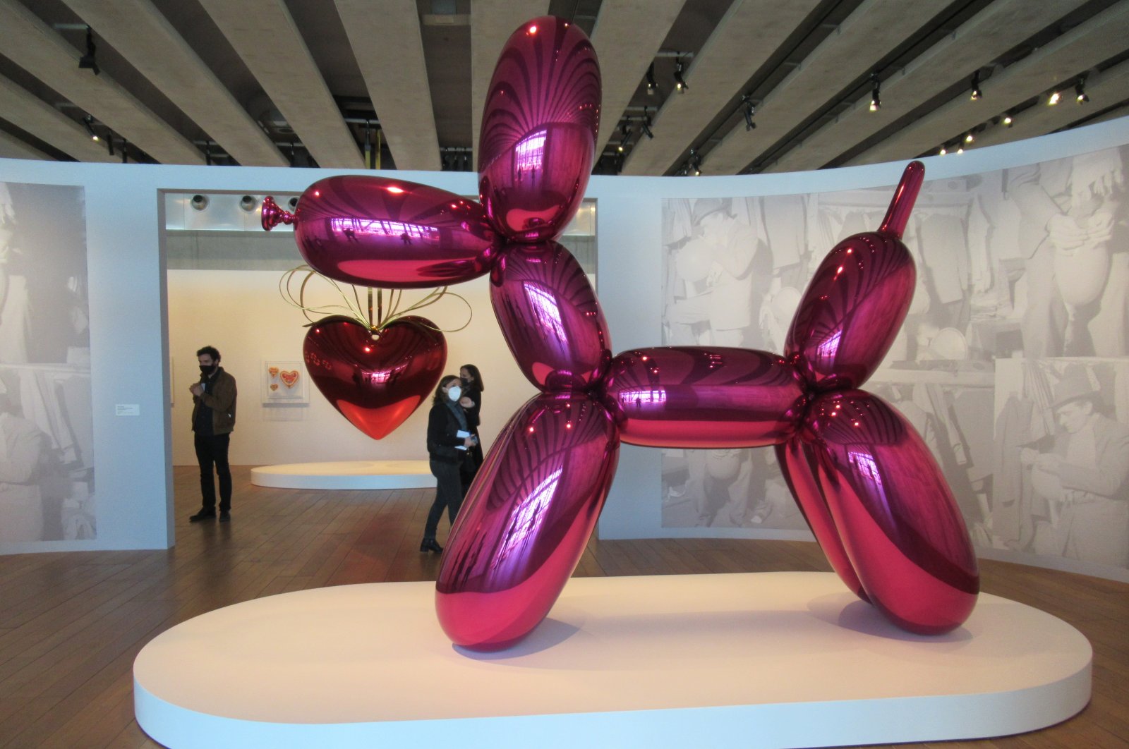 Jeff Koons' "Balloon Dog" is seen in the foreground while his "Hanging Heart" is in the background at the Mucem, Marseille, France. (DPA Photo)