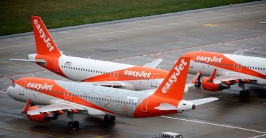 EasyJet airplanes are parked on the tarmac during the official opening of the new Berlin-Brandenburg Airport (BER) "Willy Brandt," in Schoenefeld near Berlin, Germany, Oct. 31, 2020. (Reuters Photo)