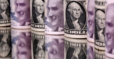 Turkish lira and U.S. dollar banknotes are seen in this illustration created on Jan. 6, 2020. (Reuters Photo)