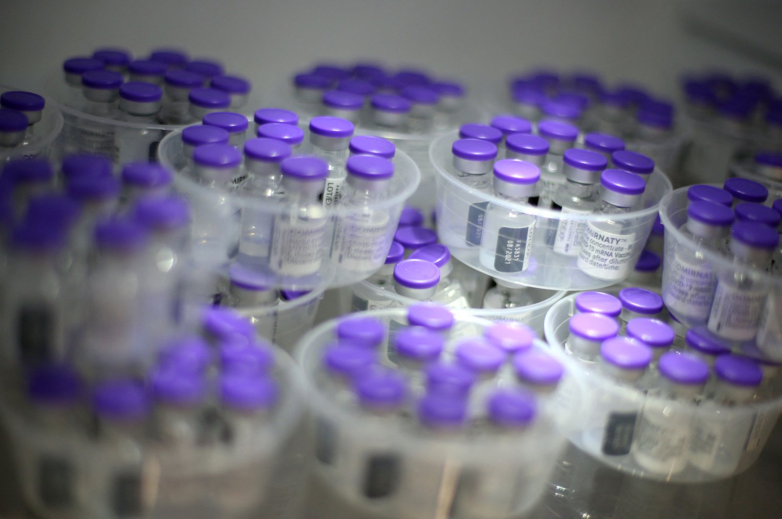 An image of vials of Comirnaty vaccine by Pfizer-BioNTech against COVID-19 in a fridge at the Baleone vaccine center in Ajaccio on the French Mediterranean island of Corsica, May 13, 2021. (AFP Photo)