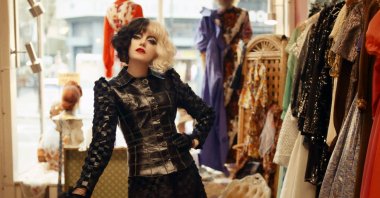 This image released by Disney shows Emma Stone in a scene from "Cruella." (Disney via AP)