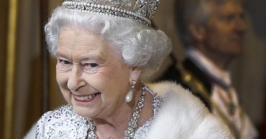 Queen Elizabeth II smiles as she leaves the State Opening of Parliament at the House of Lords on May 8, 2013 in London, England. (Getty Images)