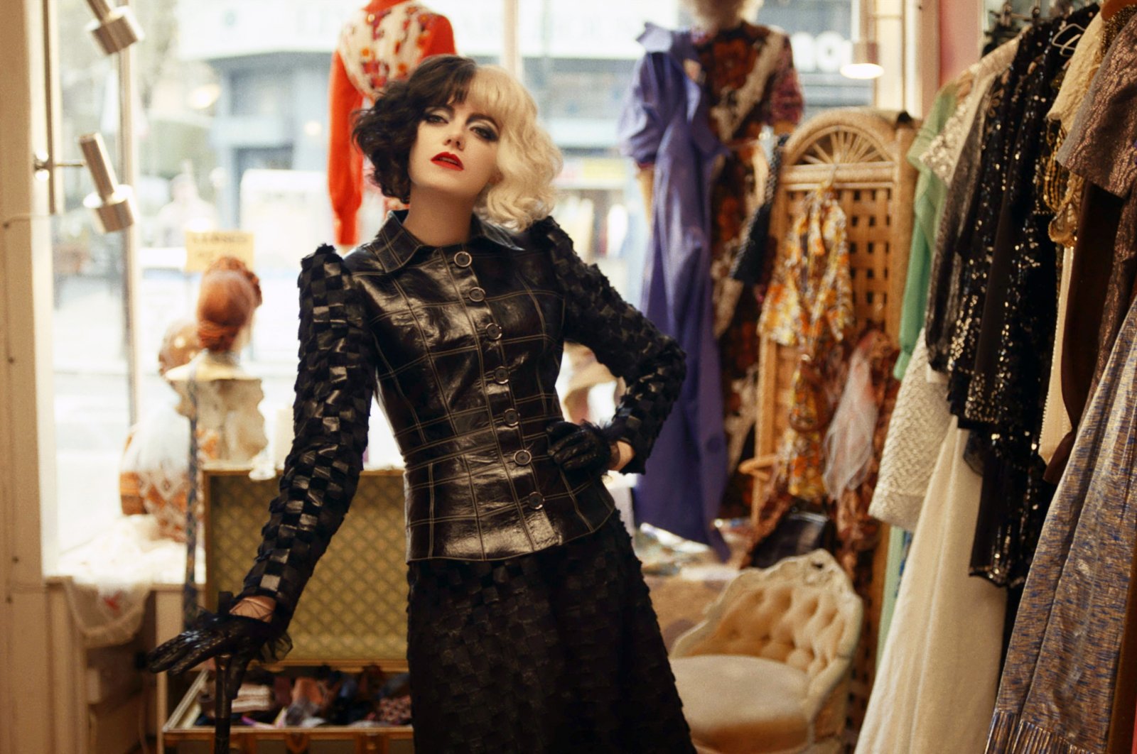 This image released by Disney shows Emma Stone in a scene from "Cruella." (Disney via AP)