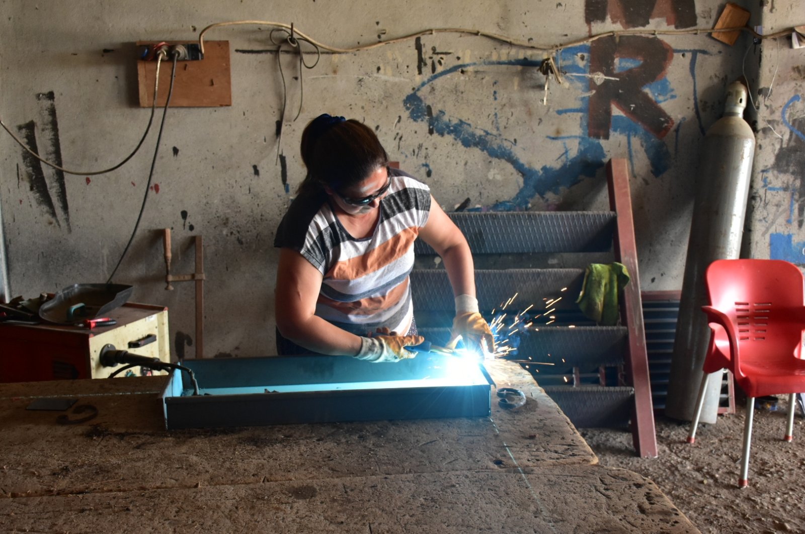 Welder Hayriye Arslan is seen in her workshop in Adana, southern Turkey, May 20, 2021. (DHA Photo)