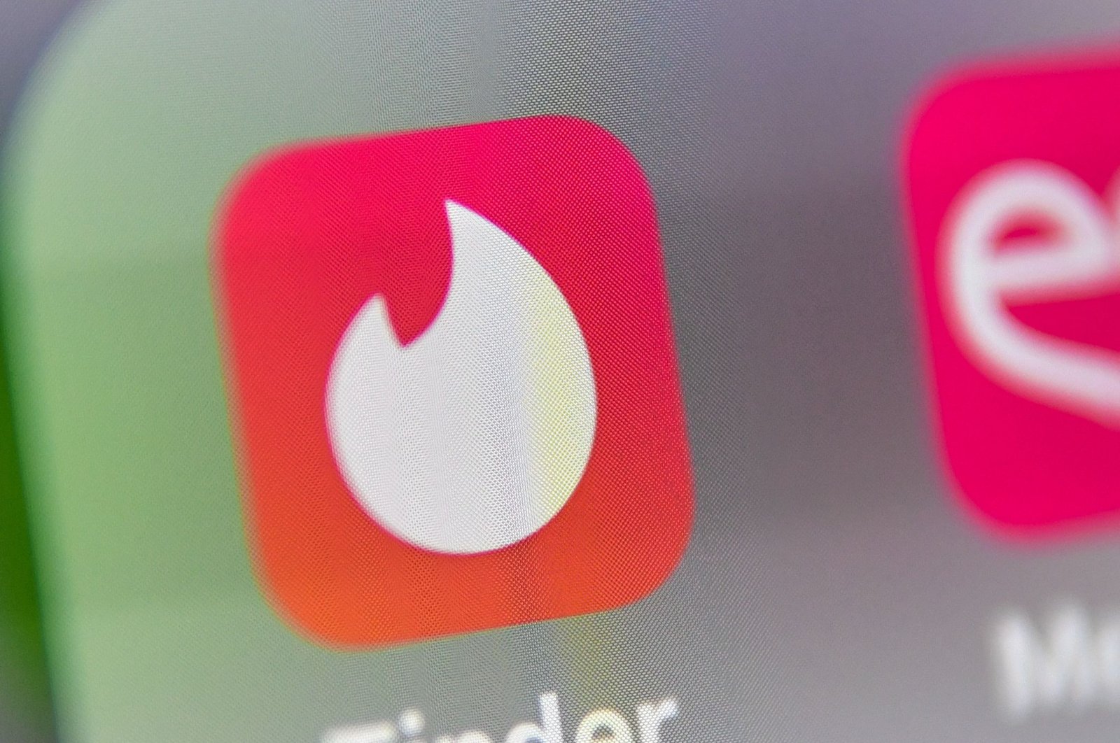 An illustration shows the logo of the U.S. social networking application Tinder on the screen of a tablet in Lille, France, May 5, 2020. (AFP File Photo)