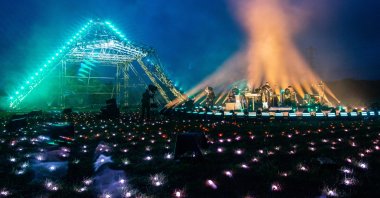 In this image released on May 22nd, Coldplay performs in front of the main Pyramid Stage as part of the Glastonbury Festival Global Livestream “Live at Worthy Farm” at Worthy Farm, Pilton on May 21, 2021 in Glastonbury, England. (Anna Barclay for Glastonbury Festival via Getty Images)