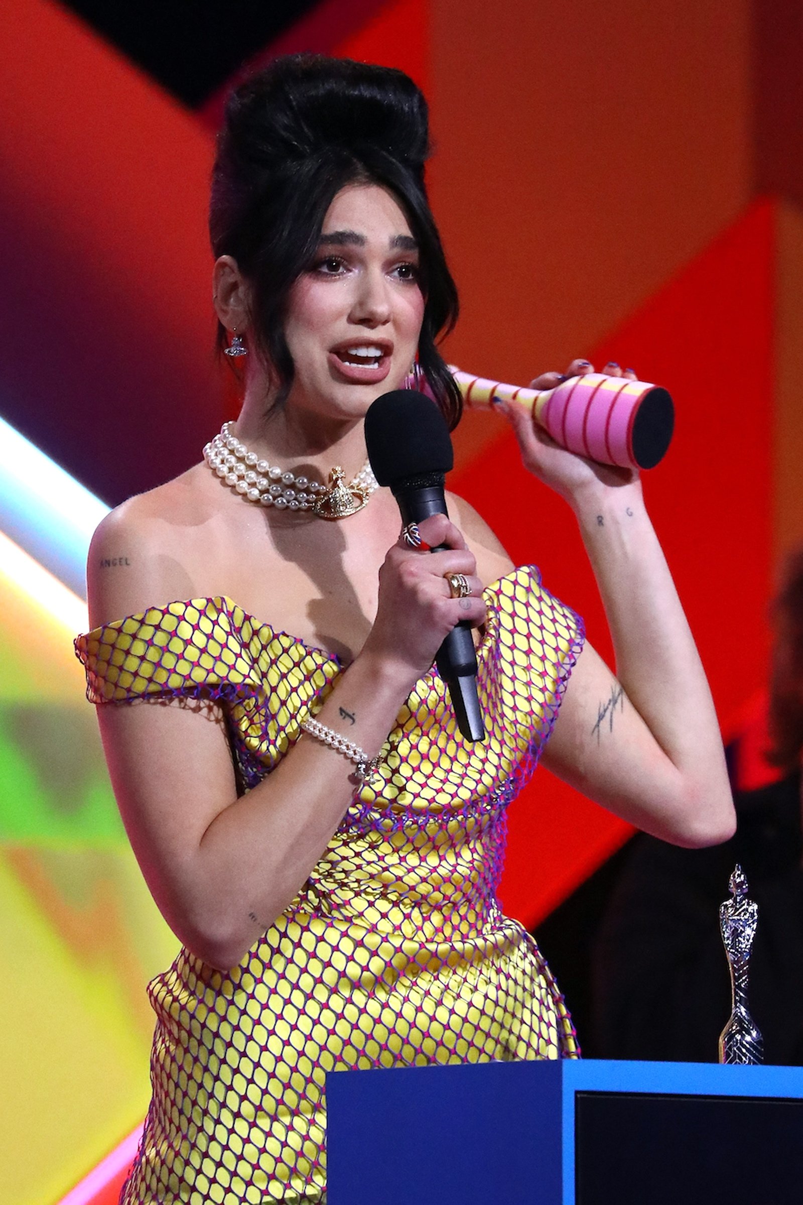 A handout photo made available by the Brit Awards shows Dua Lipa at the Brit Awards 2021 at the O2 Arena in Greenwich, Greater London, Britain, 11 May 2021. (EPA Photo)