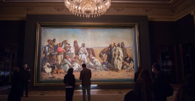 "The gazelle hunt of Prince Halim in the Gatah desert: the share of the hound dog" by Felix Auguste Clement on display at the National Palaces Museum, Istanbul, Turkey, Jan. 1, 2021. (Photo by İlhami Yıldırım)