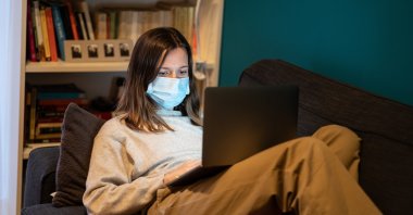 A stock photo shows a woman working from home during the COVID-19 quarantine. (Photo by Shutterstock)