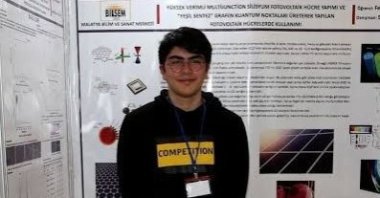 In this photo published on May 21, 2021, Feridun Balaban, a student of the Malatya Science and Arts Center in eastern Turkey who ranked first in the special award category of ISEF, poses near laboratory equipment. (AA Photo)